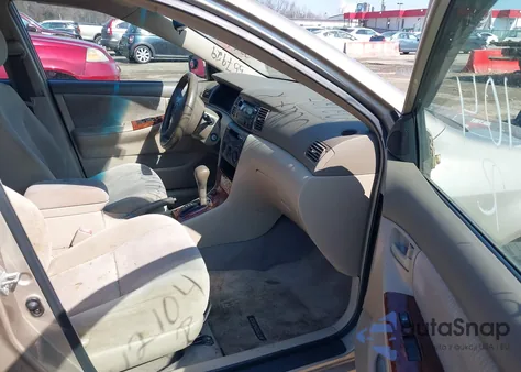 2005 Toyota Corolla Le z USA, uszkodzony, nr VIN 2T1BR32E75C557929